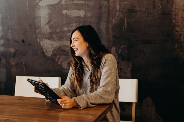 women-laughing-ipad